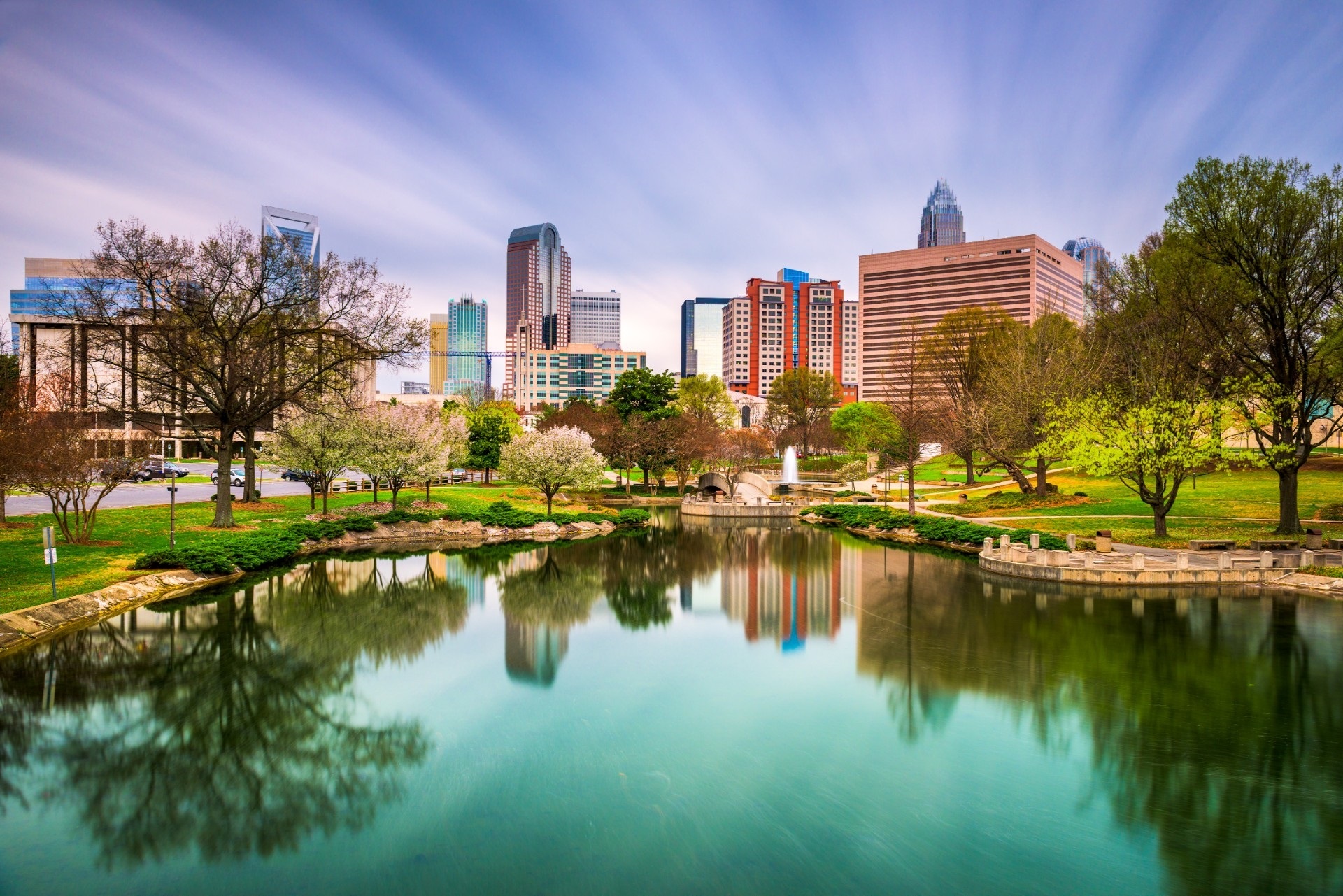 The Charlotte, North Carolina skyline reflected in a pond at Marshall Park